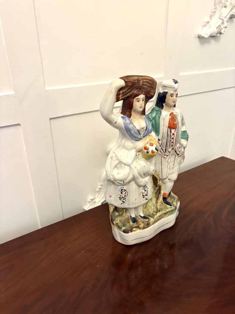 Antique Staffordshire Flatback of a Country Couple